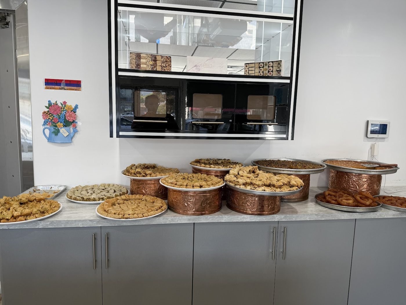 Trays of pastries on the counter at Caesar's Pastry